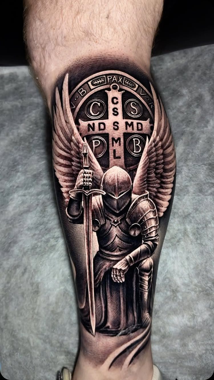 7 Knight Style Tattoo Ideas for 2026 4 A black and grey realism tattoo of a winged knight holding a sword on a leg.