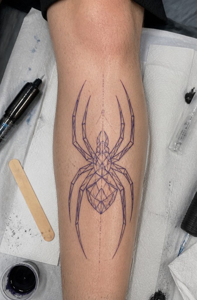 Geometric spider tattoo stencil featuring angular shapes.